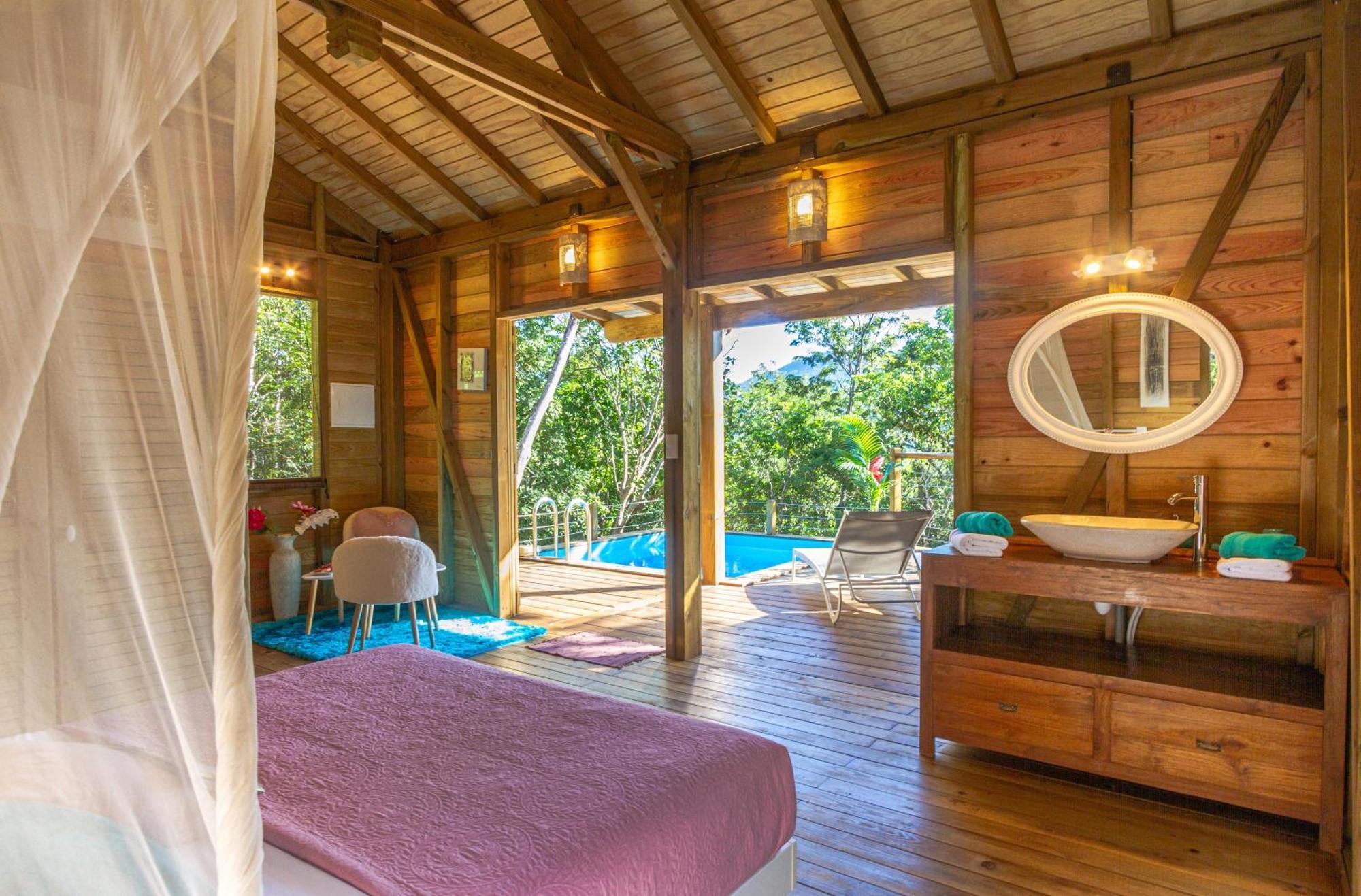 Au Jardin Des Colibris Ecolodge&Spa Deshaies Bagian luar foto